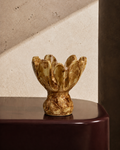 Larger tulip-shaped stoneware vase in amber-brown glaze with scalloped petal rim, styled on a tabletop
